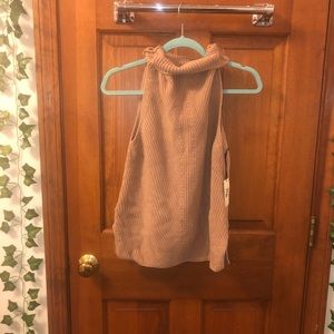 Sleeveless sweater with turtleneck